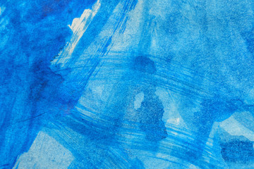 blue texture of paint smears on paper