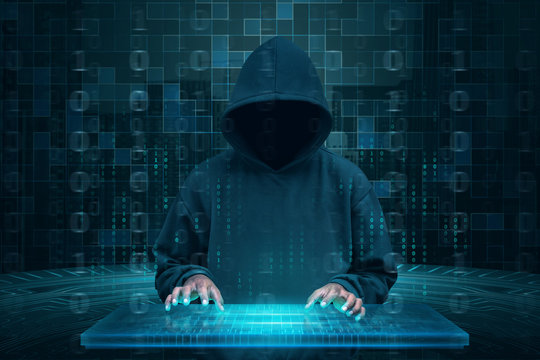 Hacker with hoodie using virtual keyboard to hacking system
