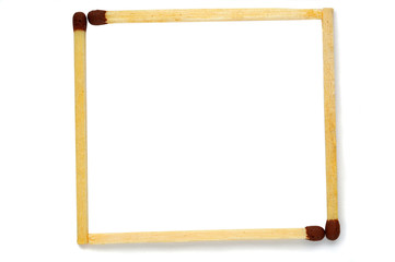 Four matches stacked in a frame on a white background