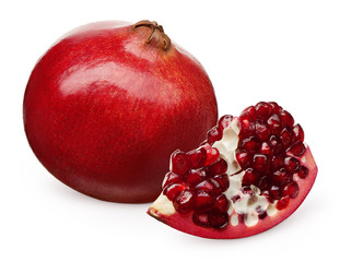 Whole fresh pomegranate and section isolated on white