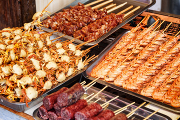Grilled small crabs and prawns. Asian street food