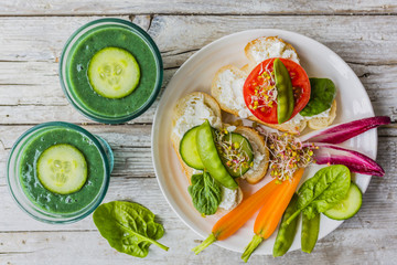 Delicious and healthy vegetarian breakfast with vegetable smoothie.