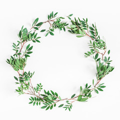 Leaf wreath. Pistachio leaves on white background. Flat lay, top view, square, copy space