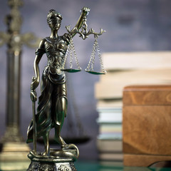 Law concept with Themis, symbol of justice.