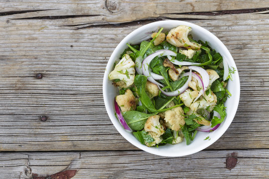 Spanach, Healthy Eating, Salad with spinach, vegetables, Top view, rustic style.