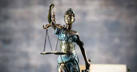 Law concept with Themis, symbol of justice.