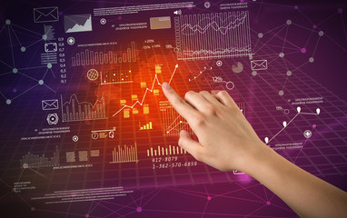 Hand touching charts