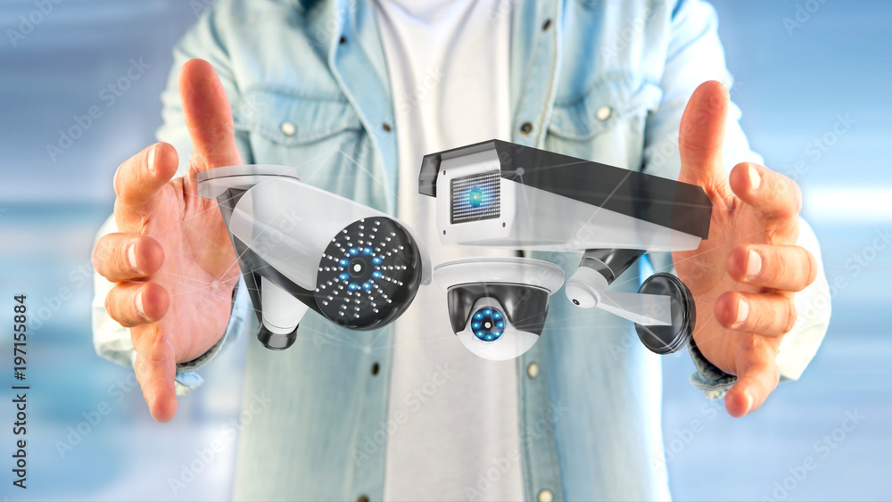 Poster businessman holding a security camera system and network connection - 3d rendering