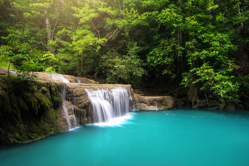 Fototapeta na wymiar Waterfall in forest at Erawan National Park, Thailand