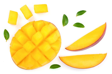 half of Mango fruit decorated with leaves isolated on white background close-up. Top view. Flat lay