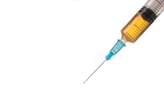 syringe with brown liquid
