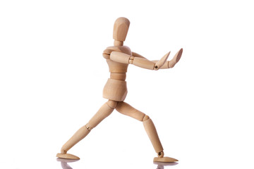 Wooden mannequin isolated on white background
