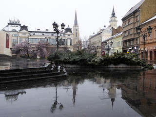 Fototapeta premium Novi Sad, Serbia, 19th March 2018: Reflection on rainy day in center of the city