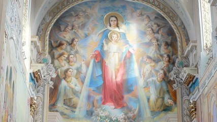 Beautiful interior of the church. The walls and ceiling of the church are painted with icons and Frescoesstories from the life of Jesus Christ