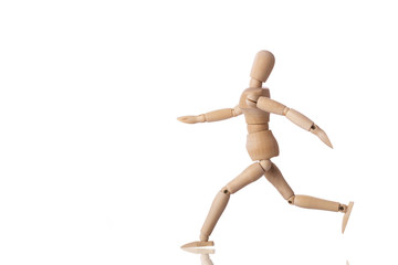 Wooden mannequin isolated on white background