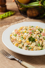 Traditional salad with cooked vegetables with mayonnaise.