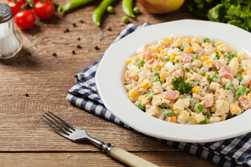 Traditional salad with cooked vegetables with mayonnaise.