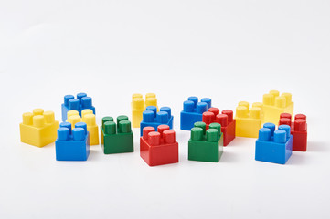 Colorful cubes of designer on white background.