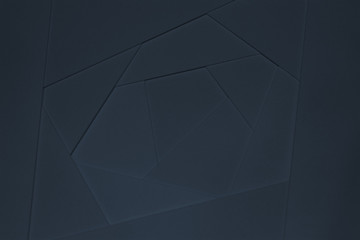 Abstract geometric background in dark tones from sheets of thick blue paper, cardboard.