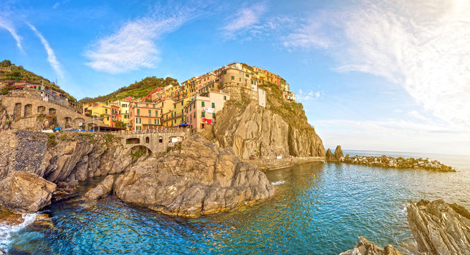 Beautiful colorful summer landscape-panorama on the coast of Manarola in Cinque Terre, Liguria, Italy, Europe in sunlight