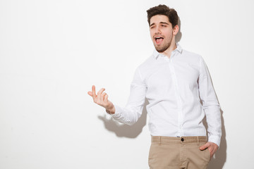 Portrait of a charming young man dressed in shirt