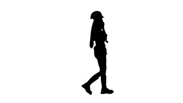 Girl with the hammer on the belt goes. Silhouette. White background . Side view