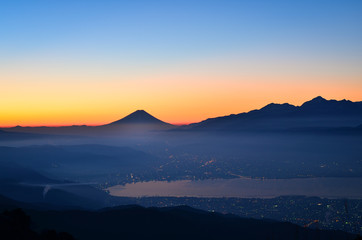 Mt. Fuji over Lake Suwa at Dawn