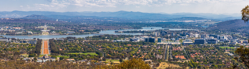 View of Canberra  from Mount Ainslie lookout - ANZAC Parade leading up to the Parliament and modern architecture. ACT, Australia - obrazy, fototapety, plakaty