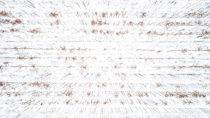 Aerial drone view of road in idyllic winter landscape