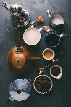 Overhead view of coffee and coffee makers on table