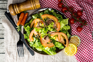 Delicious fresh salad and olive oil