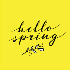 Hello Spring, hand drawn calligraphy and lettering. Design for holiday greeting and seasonal spring holiday card. Happy yellow background