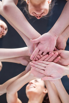 Super Teamwork. Multiracial Group of Friends with Hands in Stack. © My Ocean studio