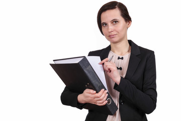 The girl holds documents and a pen in hand