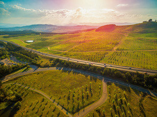 Fototapeta na wymiar Aerial Landscape of Tuggeranong Parkway passing near National Arboretum in Canberra, Australia