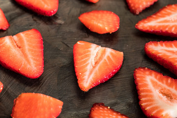 Several cut strawberries