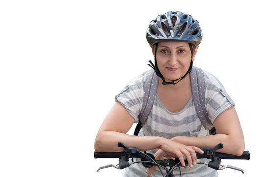 Woman Riding A Bicycle. Portrait Of Happy Middle Aged Female 40 45 50 Years Old Wearing A Bike Helmet Isolated On White Background