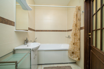 Small beige bathroom