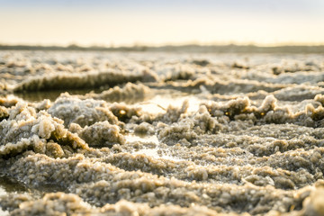 Close up of salt fields by sunset in Algarve, Portugal