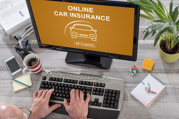 Online car insurance concept on a computer