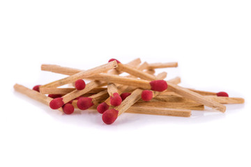 Pile of matches isolated on white background