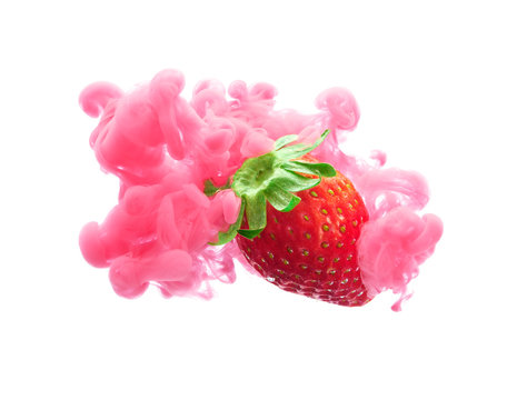 Strawberry on ink isolated over white background
