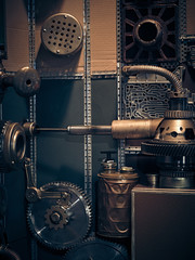 Closeup of gears and manometers of construction with copper tubes.