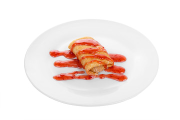Pancake sweet stuffed with berry decoration, strawberry topping, on a plate isolated white background. Dessert for a menu in a cafe, restaurant, coffee shop side view