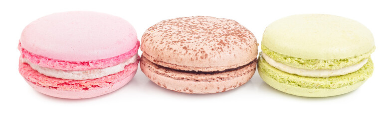 Sweet macaroons in row isolated on white