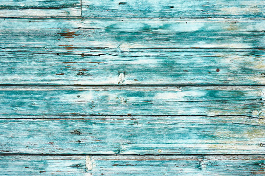 Old wooden background colored blue paint.