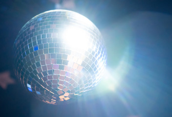 Fototapeta na wymiar Sparkling disco ball. Concept of night party.