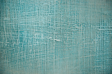 Textured blue - gray wall in the form of jeans.