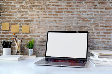 workspace with computer blank white screen.