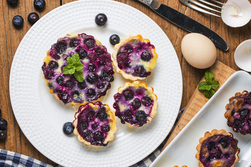 Blueberry tart, pie, tartlet with vanilla custard.